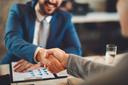 Business agreement with handshake