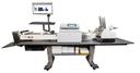 MaestroJet Printer on table with conveyor and stacker