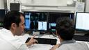 Martin Pappon and Dr. Silvano Gnesin examine Biograph Vision images at CHUV.