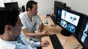 Dr. Mario Jreige and Martin Pappon study Biograph Vision’s images.