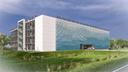 Das Parkhaus wird an der westlichen Seite mit Lamellen, die einer Ostseewelle nachempfunden sind, verkleidet. Dies dient dem Lärm- und Blendschutz zur Wohnbebauung hin.