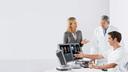 Team of health professionals discussing scan results