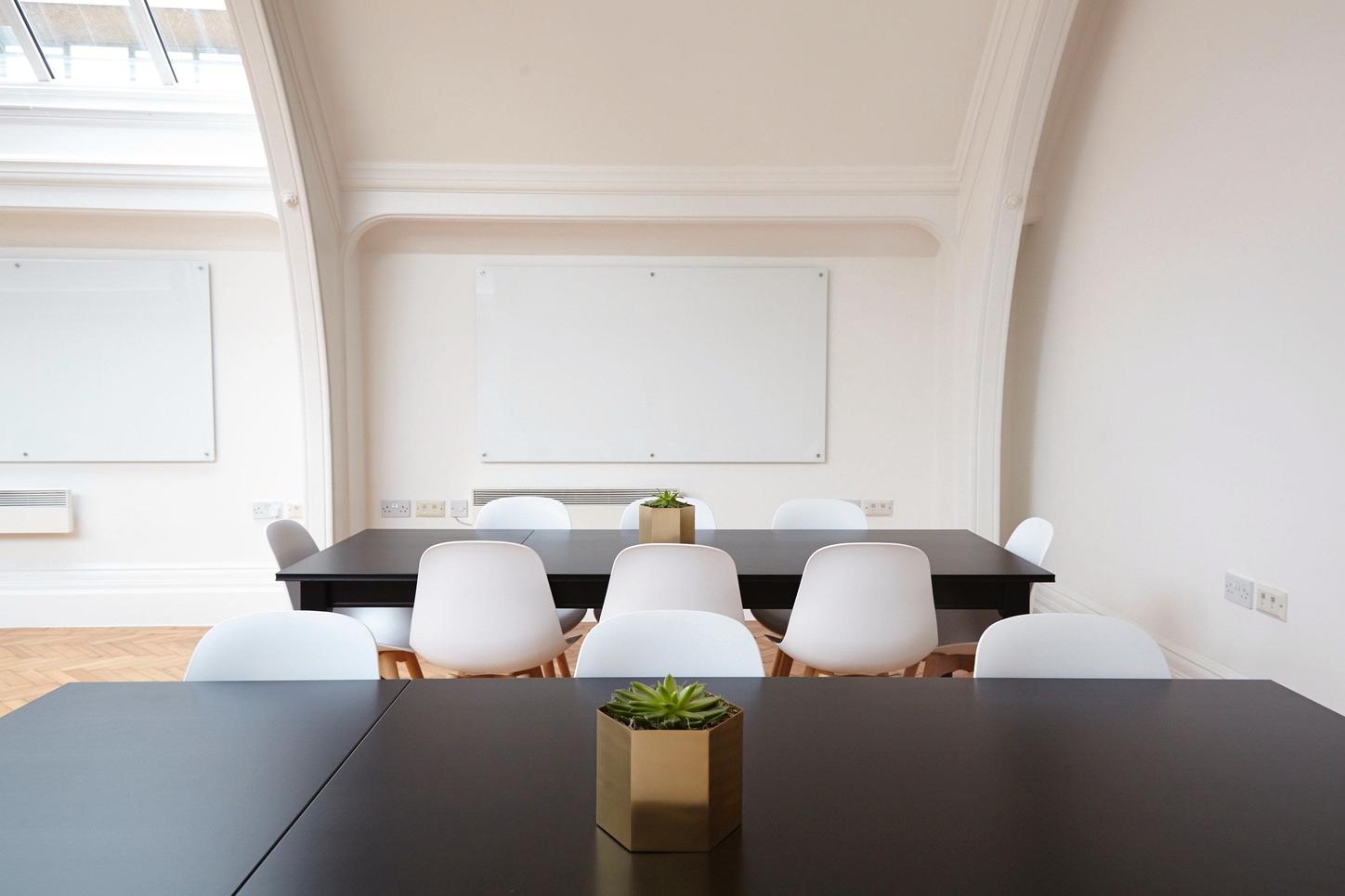 Black tables with white chairs