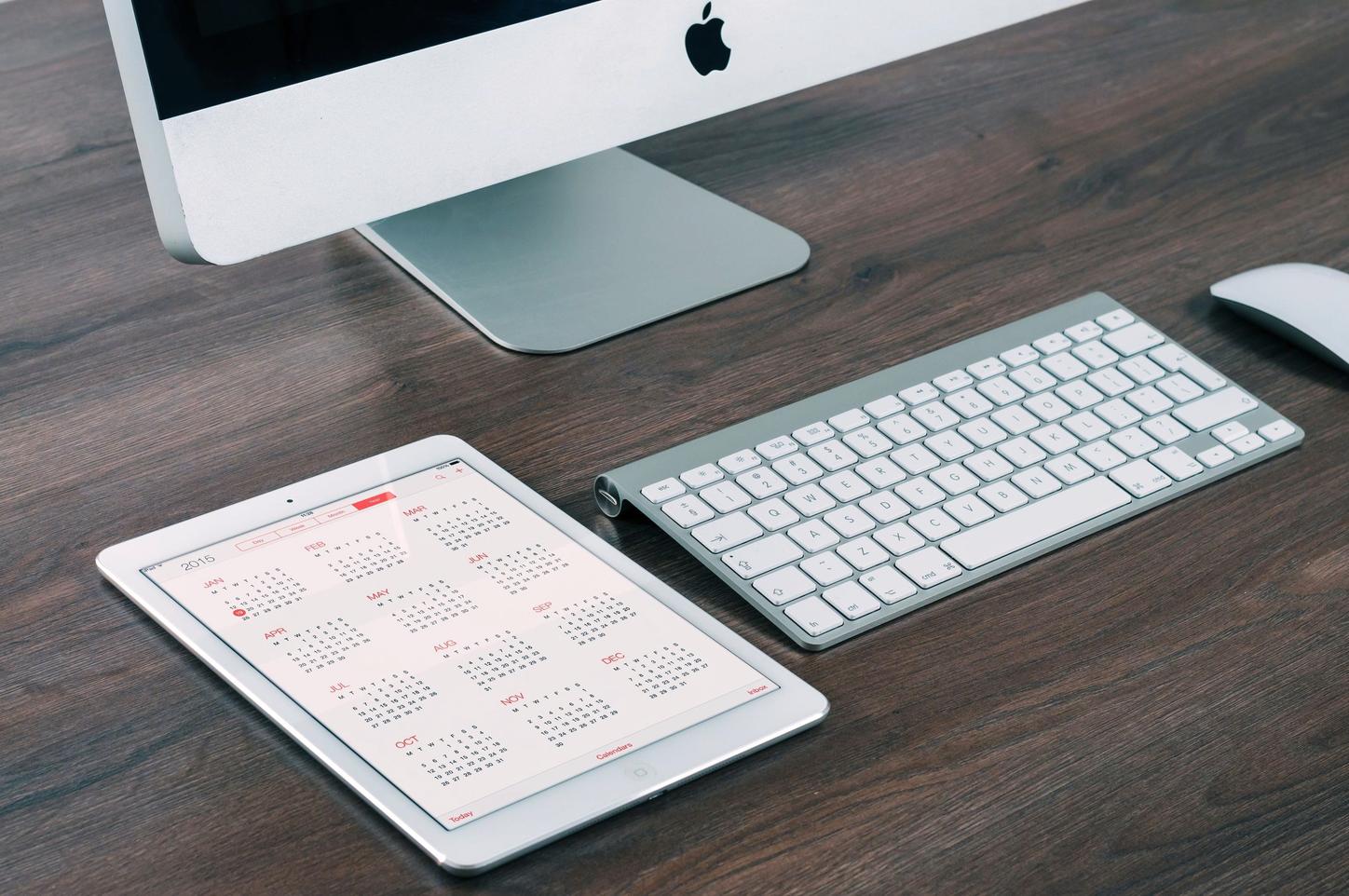 Apple workstation with calendar and Ipad