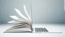 View of a combination of book pages (left) and opened laptop (right).