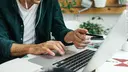 Man with laptop working remotely from home