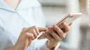 Smartphone in the hand of a woman