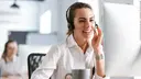 Woman on the phone with a headset at work