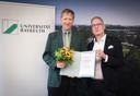 Prof. Dr. Stefan Leible and Prof. Dr. Volker Ulm at the latter's appointment as Vice President for Teaching and Student Affairs