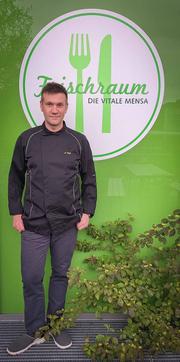 Foto von Andreas Voigt vor dem Frischraum
