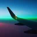 Visual Sustainability Aircraft wing in sunrise